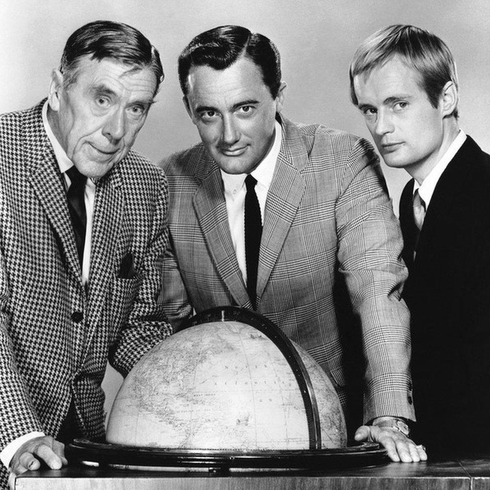 Robert Vaughn as Napoleon Solo along with co-stars David McCallum, right, and Leo G. Carroll