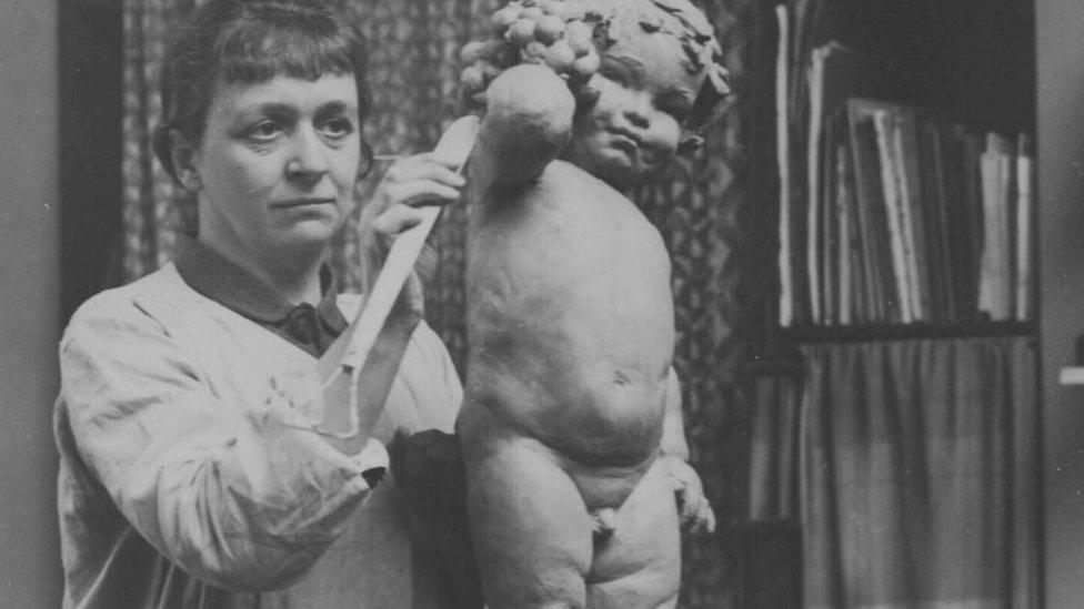 Anne Acheson making a sculpture