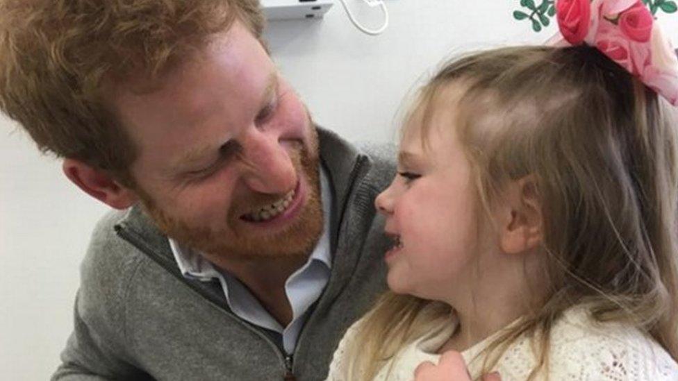 Prince Harry with Amelia Carroll during his private visit to Great Ormond Street Hospital in London,