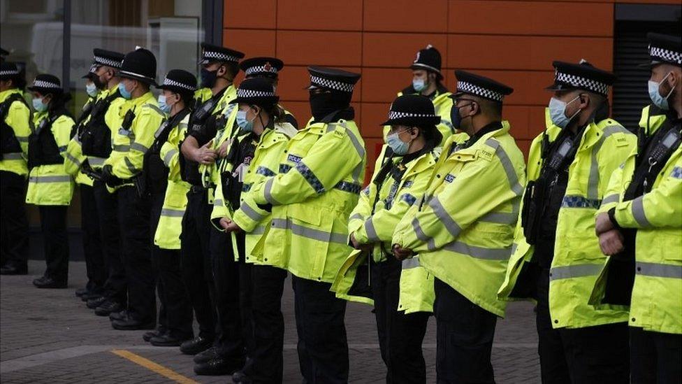 Police officers at the Lowry Hotel