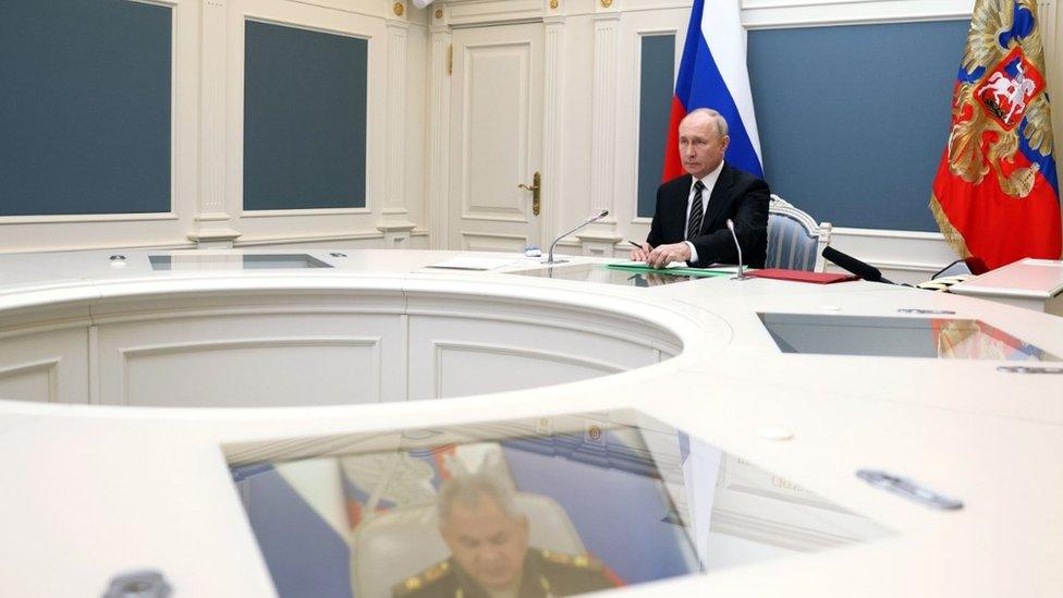 State TV shows the defence minister recounting the tests to Vladimir Putin