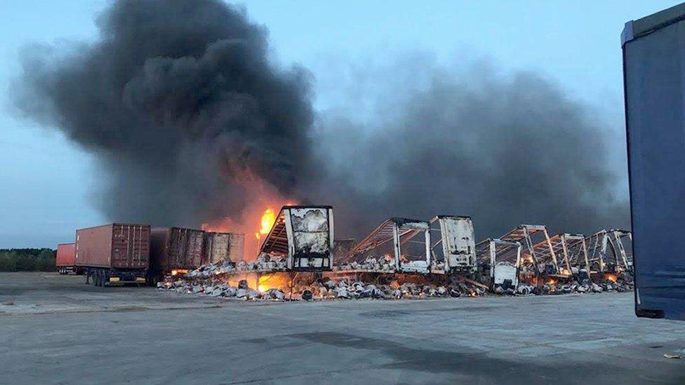 Fire-damaged lorry trailers