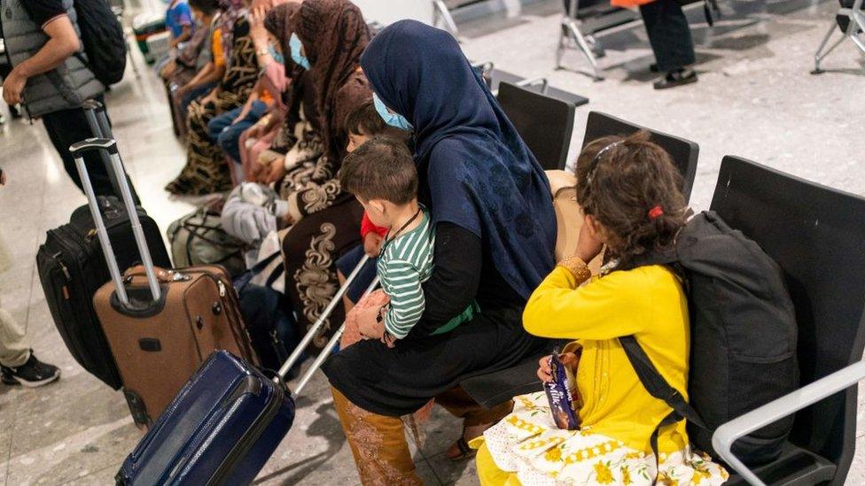 refugees-at-heathrow-airport.