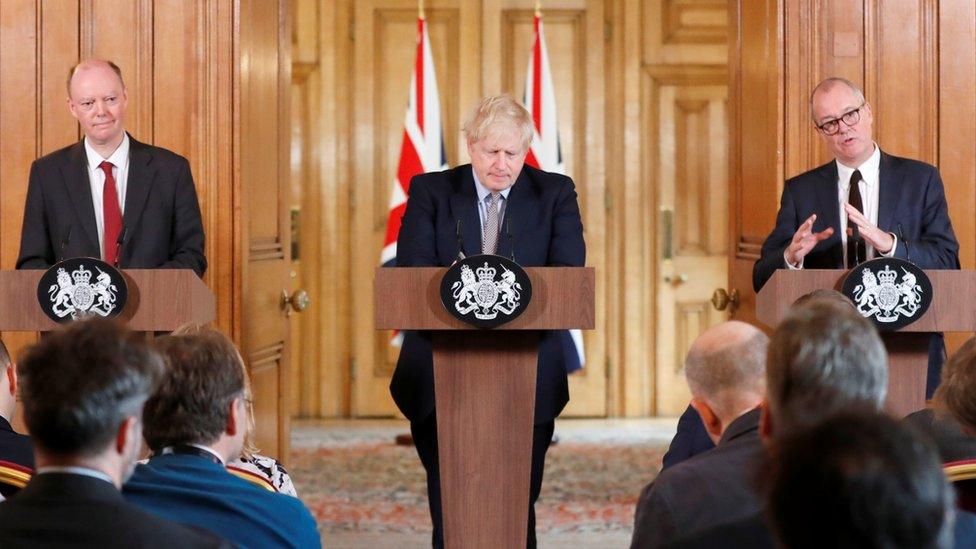 Boris Johnson gives a press conference with Chris Whitty, the chief medical officer, and Patrick Vallance, the chief scientific advisor, in Downing St