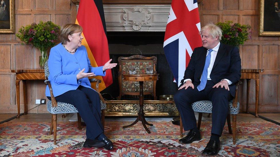 Prime Minister Boris Johnson with the Chancellor of Germany, Angela Merkel, before their bilateral meeting at Chequers