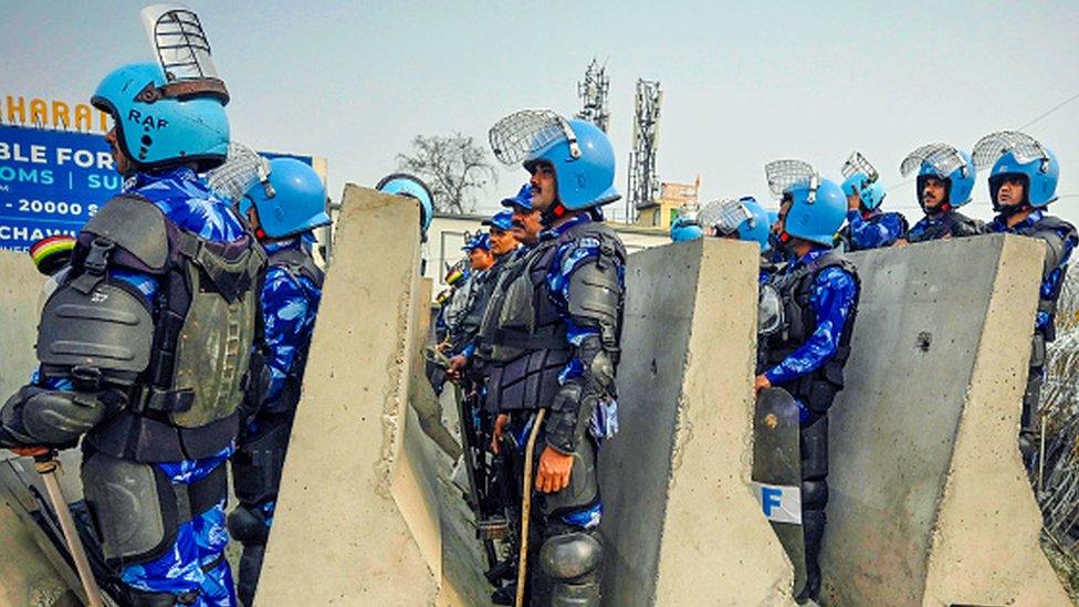 Delhi Police and Security forces officials preparing security arrangements at Singhu Border Delhi-Haryana Border, ahead of the farmers' call for March to Delhi