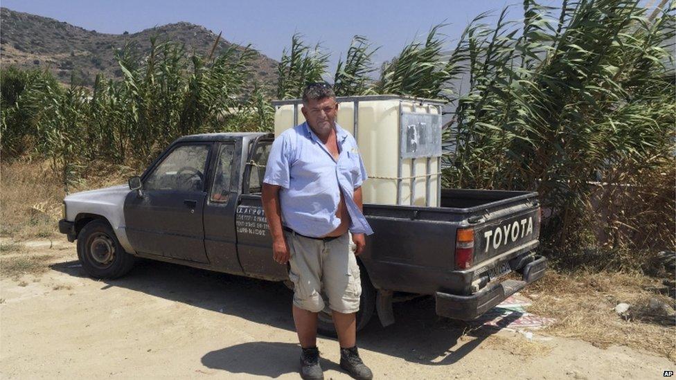 Potato farmers Stelios Vathrokilis