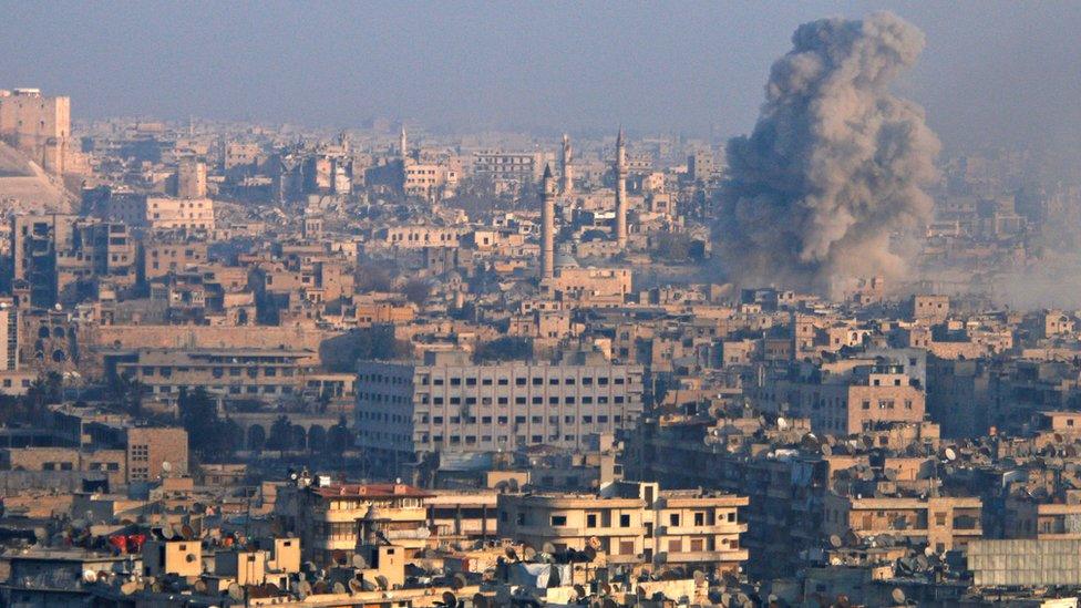 Smoke rising an area of Aleppo