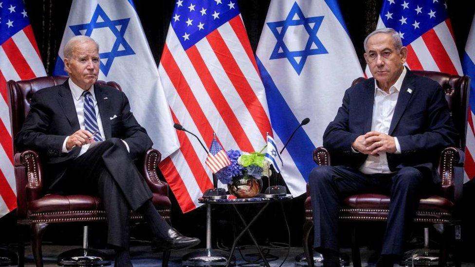 President Joe Biden, left, pauses during a meeting with Israeli Prime Minister Benjamin Netanyahu, right, to discuss the war between Israel and Hamas