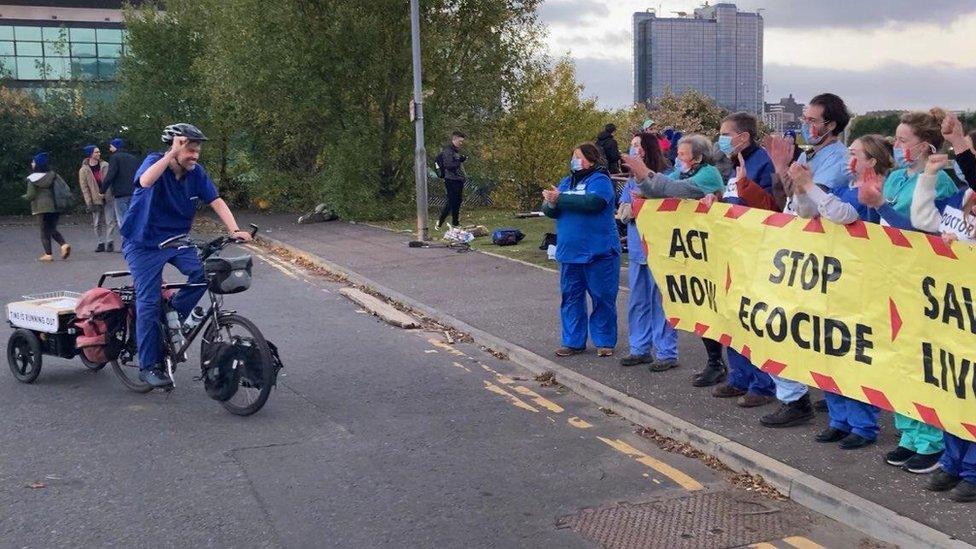 Mr McDonald delivering his ice block close to the COP26 summit