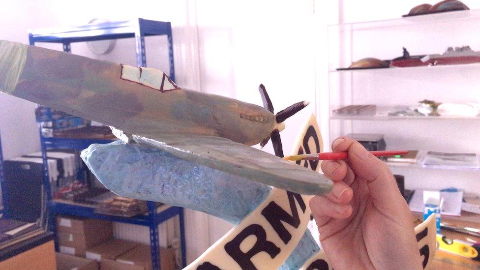 Painting a chocolate Spitfire