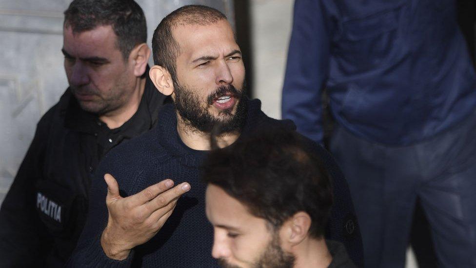 Andrew Tate leaves court during his trial in Bucharest on 1 February