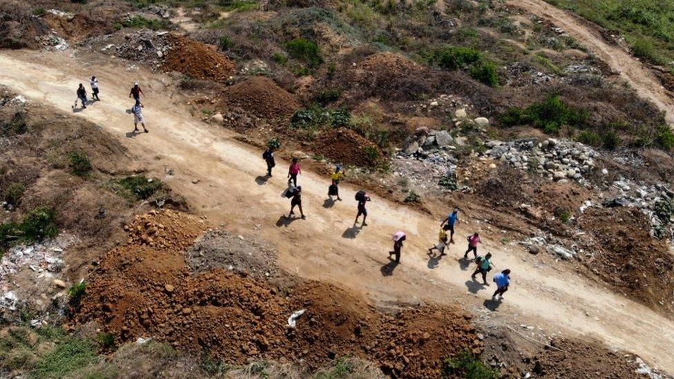 Venezuelans cross from their country through "Trochas" - illegal trails - near the Simon Bolivar International Bridge in Villa del Rosario, Norte de Santander, Colombia