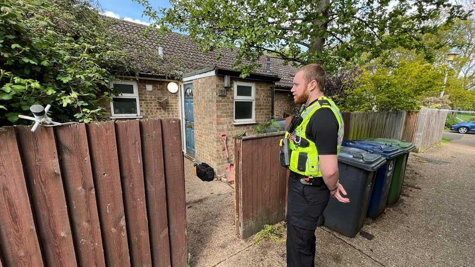 Police officer at Oswald Close, Ramsey