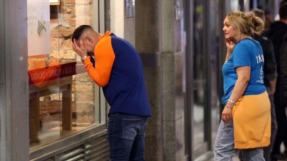 devastated fan in George Square