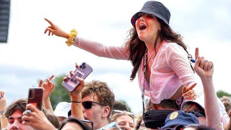 The TRNSMT crowd get into the festival mood early on Friday as the Bootleg Beatles take to the stage