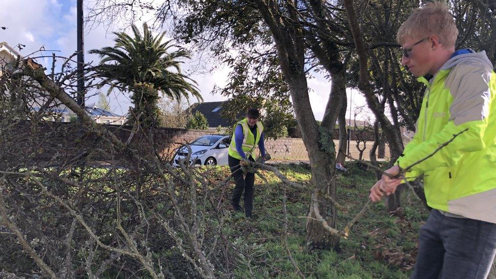 Volunteers clearing up road in St Brelade