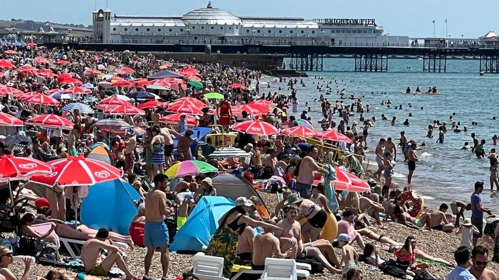 Brighton beach packed with people