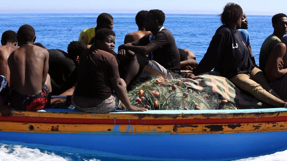 Libyan coastguards help rescue illegal immigrants attempting to reach Europe off the coastal town of Guarabouli, 60 kilometres (36 miles) east of the capital, on July 8, 2017