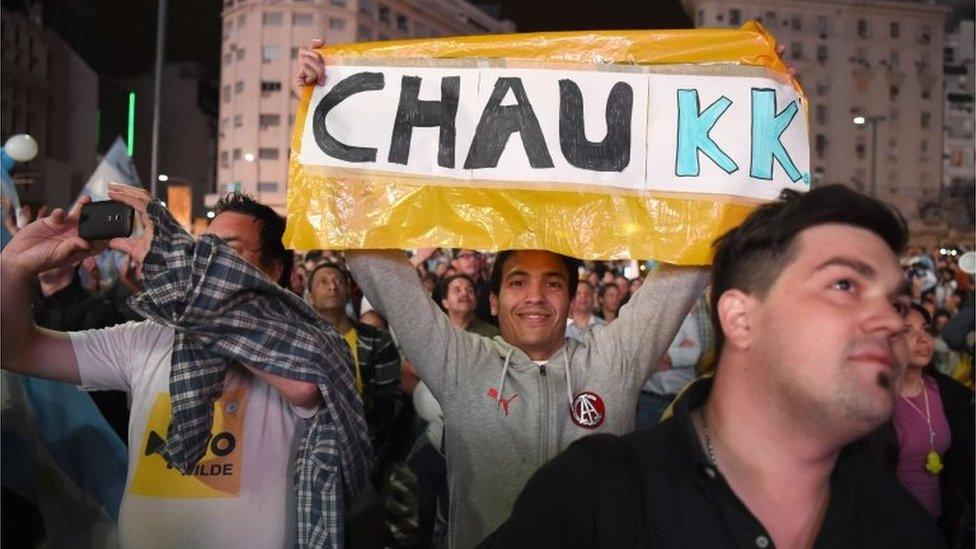 Supporters of the victorious presidential hopeful of the Cambiemos party, Mauricio Macri celebrate his win over leftist Daniel Scioli on 22 November, 2015.