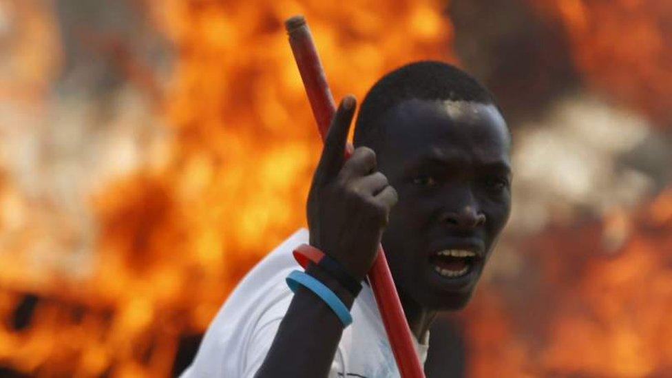 A protester in Burundi angered at President Pierre Nkurunziza's decision to run for a third term