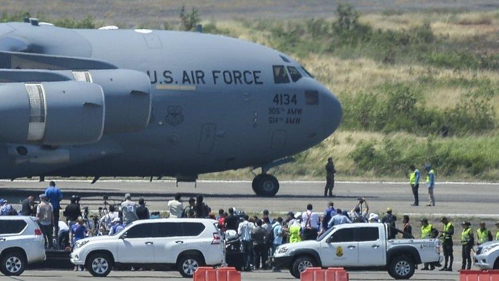 Food and medicine aid for Venezuela is unloaded from a US Air Force C-17 aircraft at Camilo Daza International Airport in Cucuta, Colombia in the border with Venezuela on February 16, 2019.