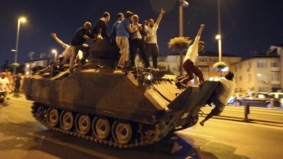 People occupy a tank in Istanbul, Turkey, 16 July 2016