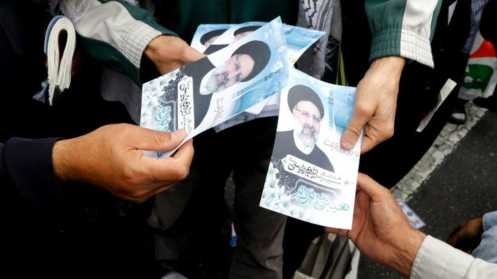 Flyers are handed out for candidate Ebrahim Raisi in Tehran