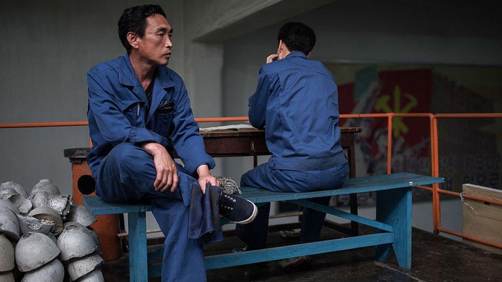 Workers from a factory near North Korea's border with China