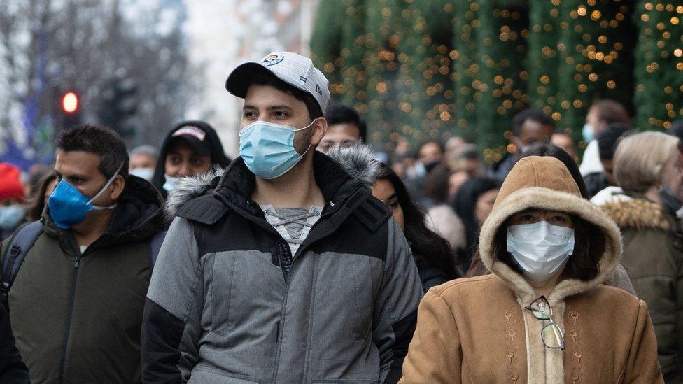 Shoppers wearing masks outside Selfridges on Boxing Day