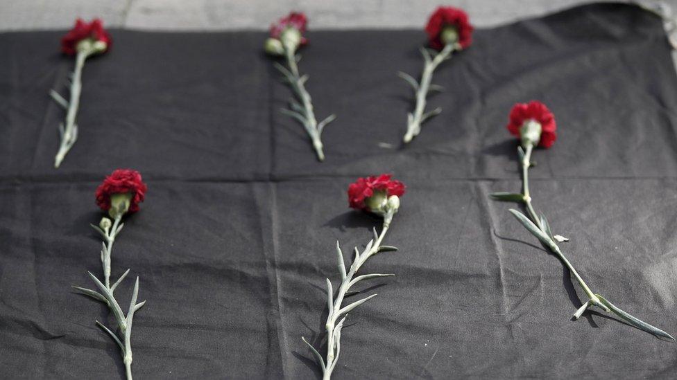 Carnations laid out at the site of earlier blasts in Ankara, Turkey - Saturday 10 October 2015