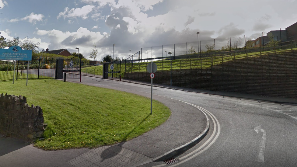 Front of Assumption grammar school in Ballynahinch showing sign