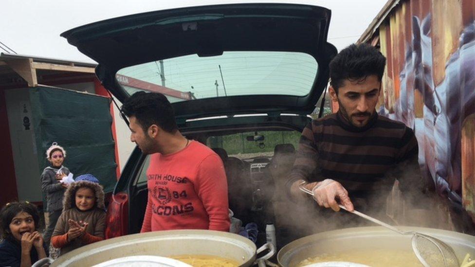 Food being served at the camp