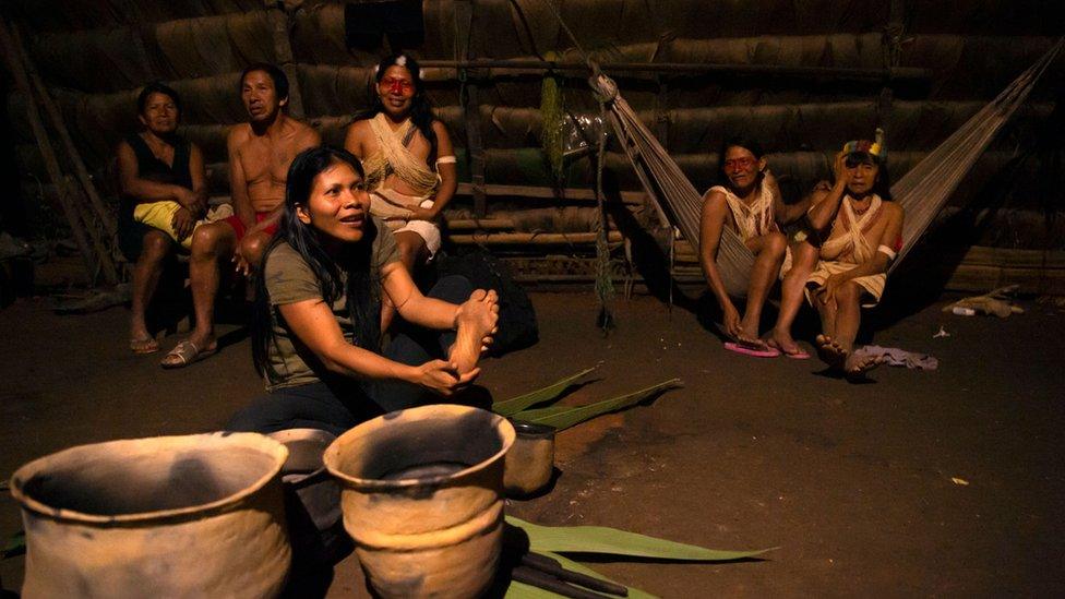 Waorani at a house in the village of Nemompare, on the banks of the Curaray river, in Pastaza province, Ecuador on April 14, 2019.