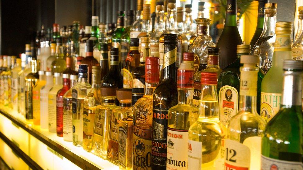 Bar with bottles of alcohol