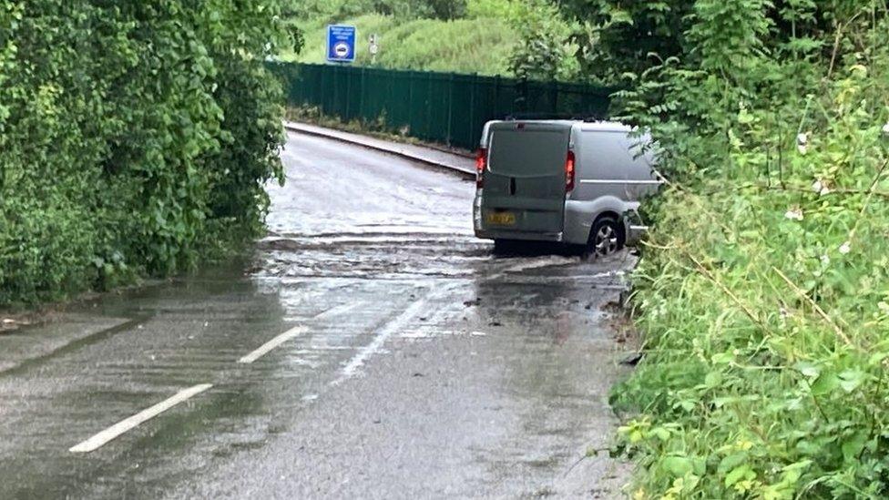 A van driving through flood water in Needham Market