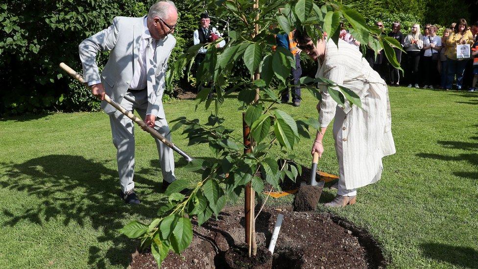 Ana's parents plant a tree in her memory during a special ceremony the Leixlip Manor Hotel in County Kildare