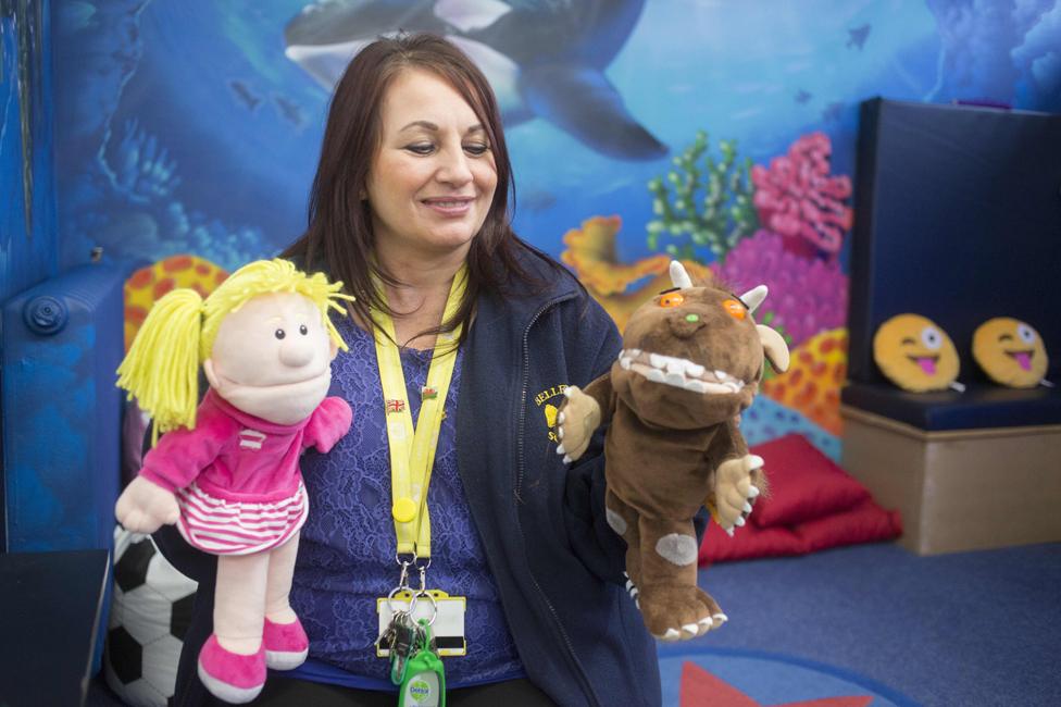 Lorraine Harvey holding soft toys