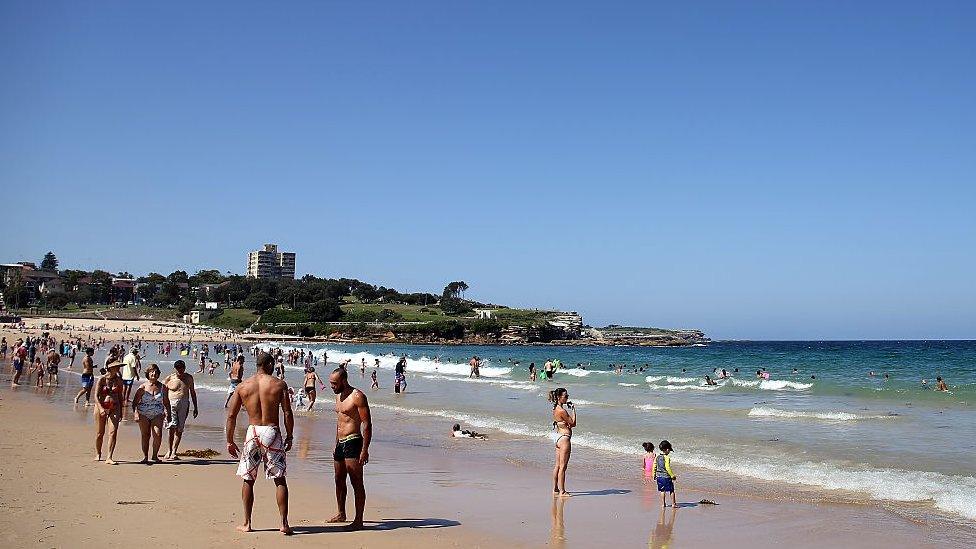 Beachgoers enjoy the hot weather at Coogee Beach on January 13, 2016