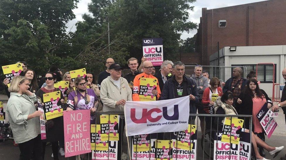 Teachers protesting outside college