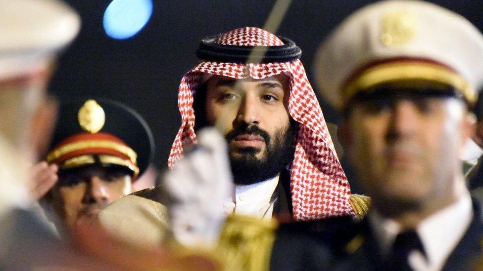 Saudi Crown Prince Mohammed Bin Salman pictured behind a military band in Algiers on 2 December 2018