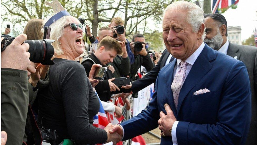 King Charles meets well-wishers in the crowds at the Mall in London