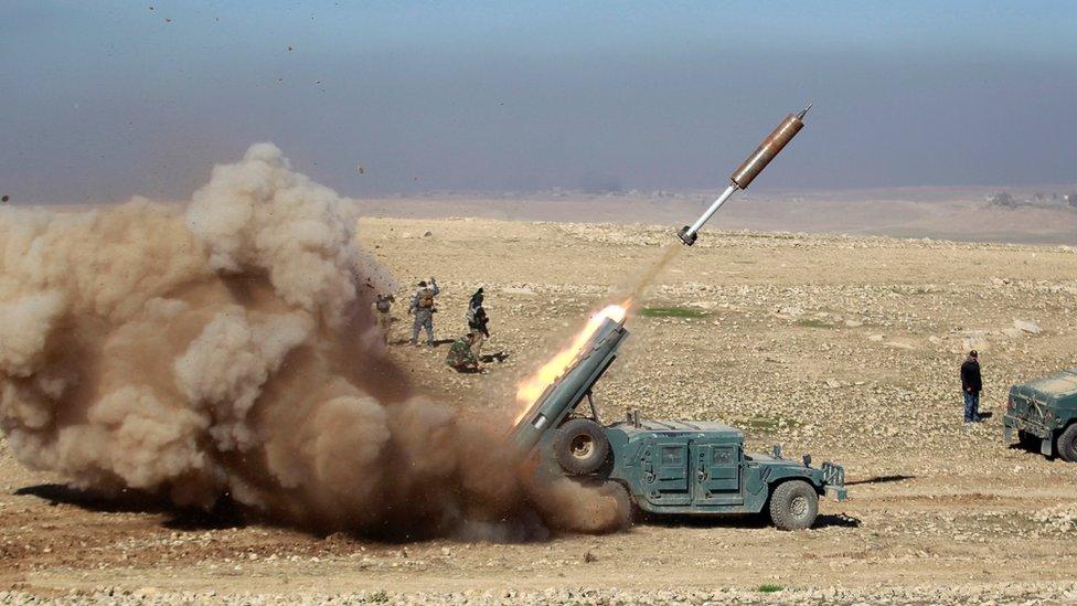 Members of the Iraqi rapid response forces fire a missile toward Islamic State militants during a battle in south of Mosul, Iraq February 19, 2017