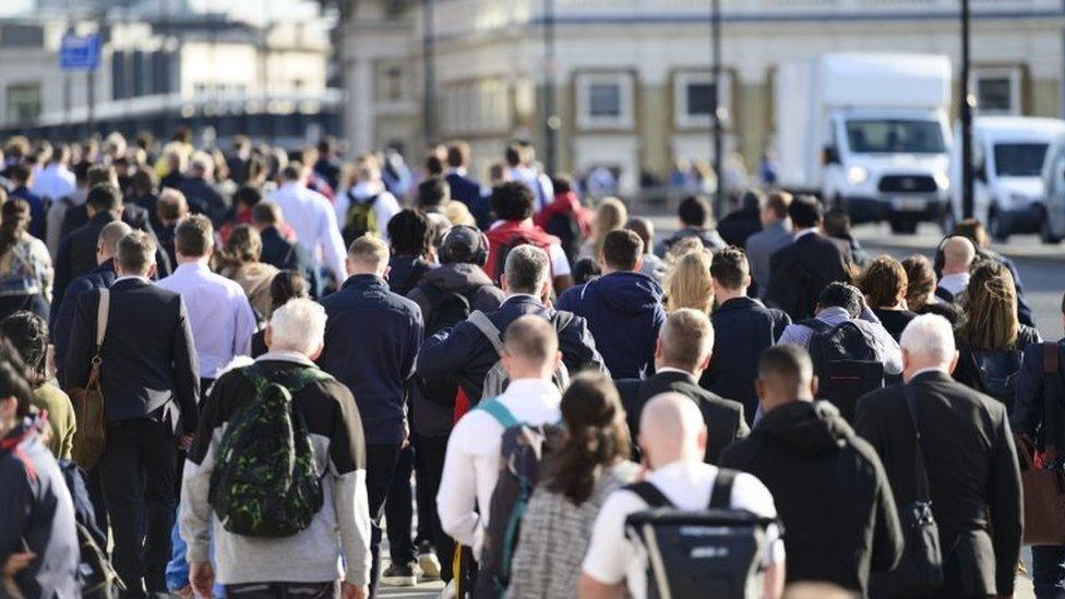 File image showing a large crowd of people commuting to work in London