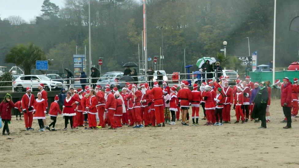 Group dressed as Santa