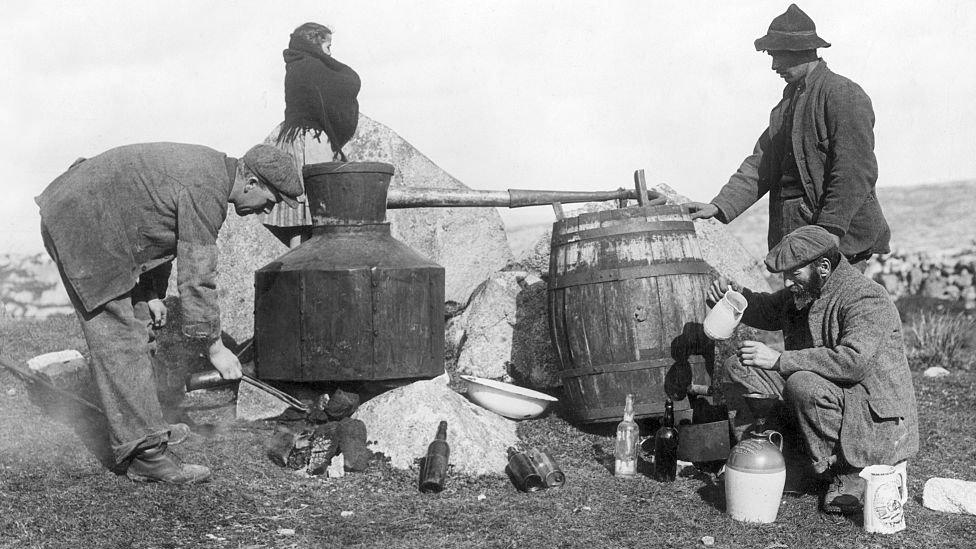 Men producing poitin in the 19th Century