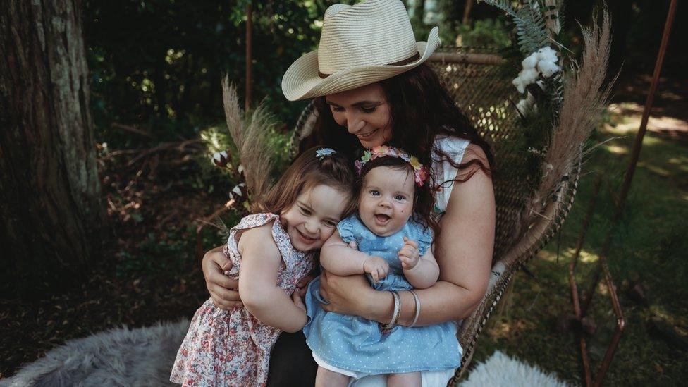 Emma Elias with her daughters