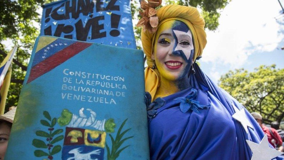 Pro-government supporters demonstrate in support of the National Constituent Assembly (ANC) in Caracas, Venezuela, 04 August 2017.