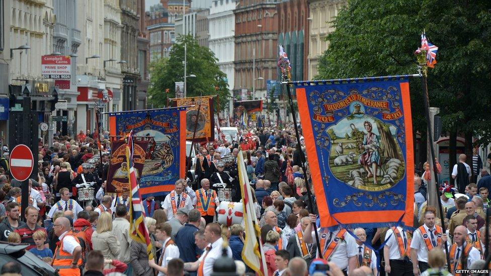 Thousands of people lined the streets to watch the parades pass through Belfast City Centre.