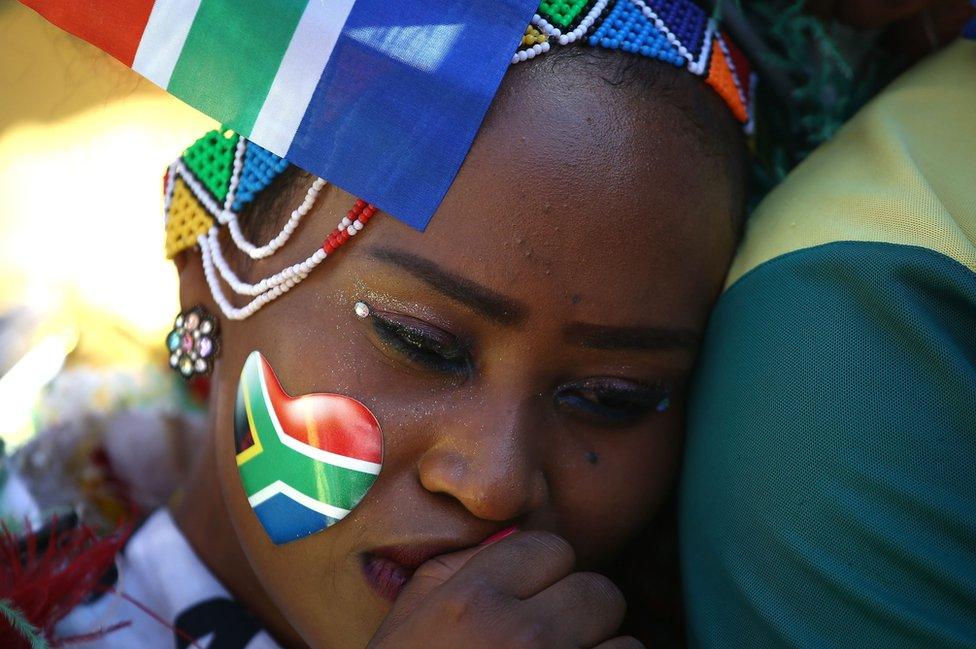 South African sporting fans react with disappointment following the announcement of the winning candidate to host the 2023 Rugby World Cup at a public viewing area in Sammy Marks Square, Pretoria on November 15, 2017. Pre-vote favourites South Africa complained that the bidding process to host the 2023 World Cup had gone "opaque" over the last two weeks as it lost out to rival bidders France on November 15, 2017. The French were highly critical of an evaluation report which said South Africa should be chosen. The remaining members of the World Rugby Council disagreed with the report and voted overwhelmingly for France.